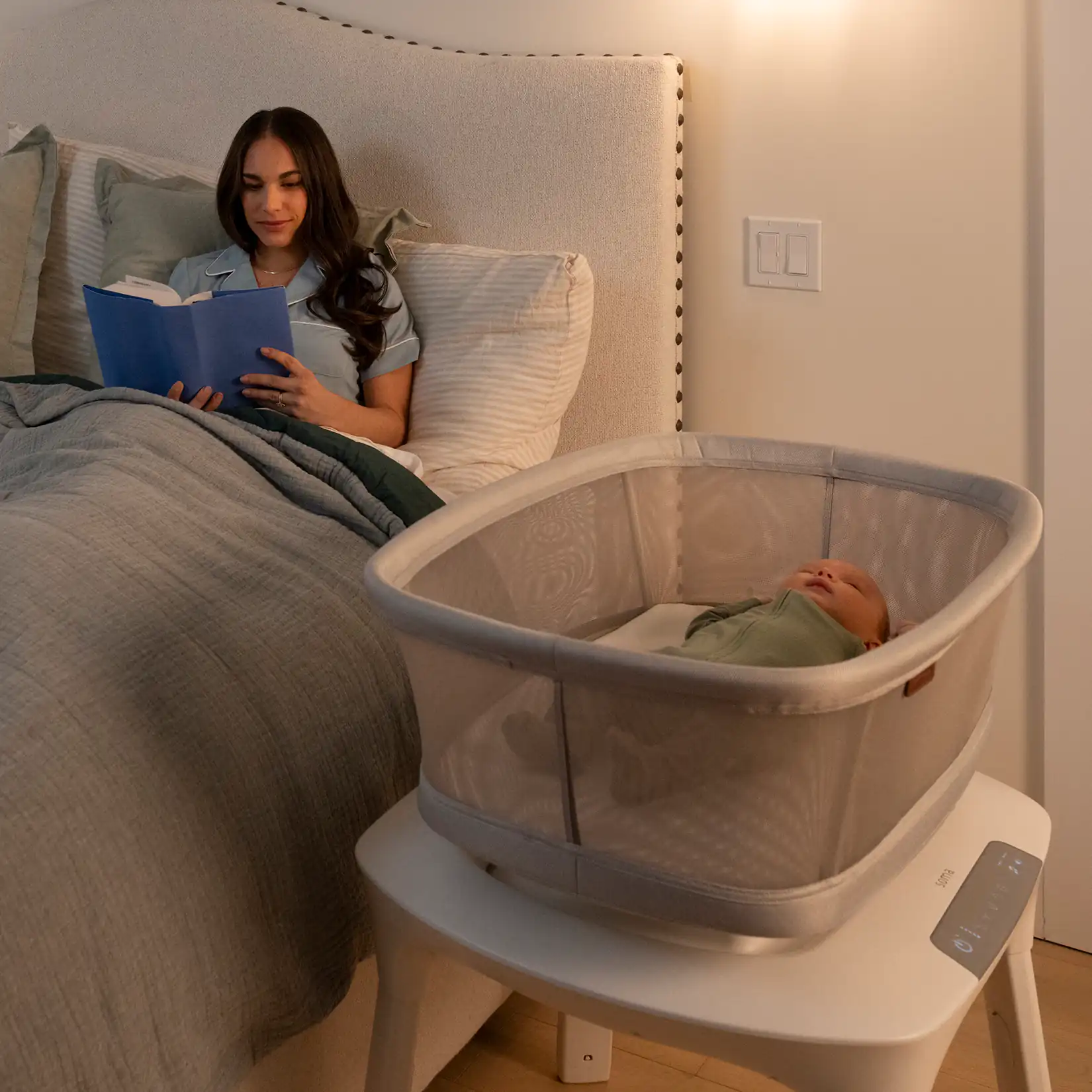 bassinet next to bed