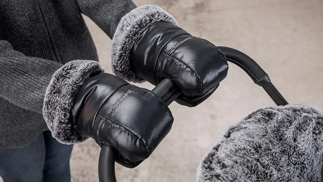 Pushing stroller with CozyHandmuffs Luxe